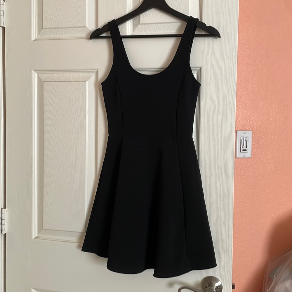 Divided black skater dress